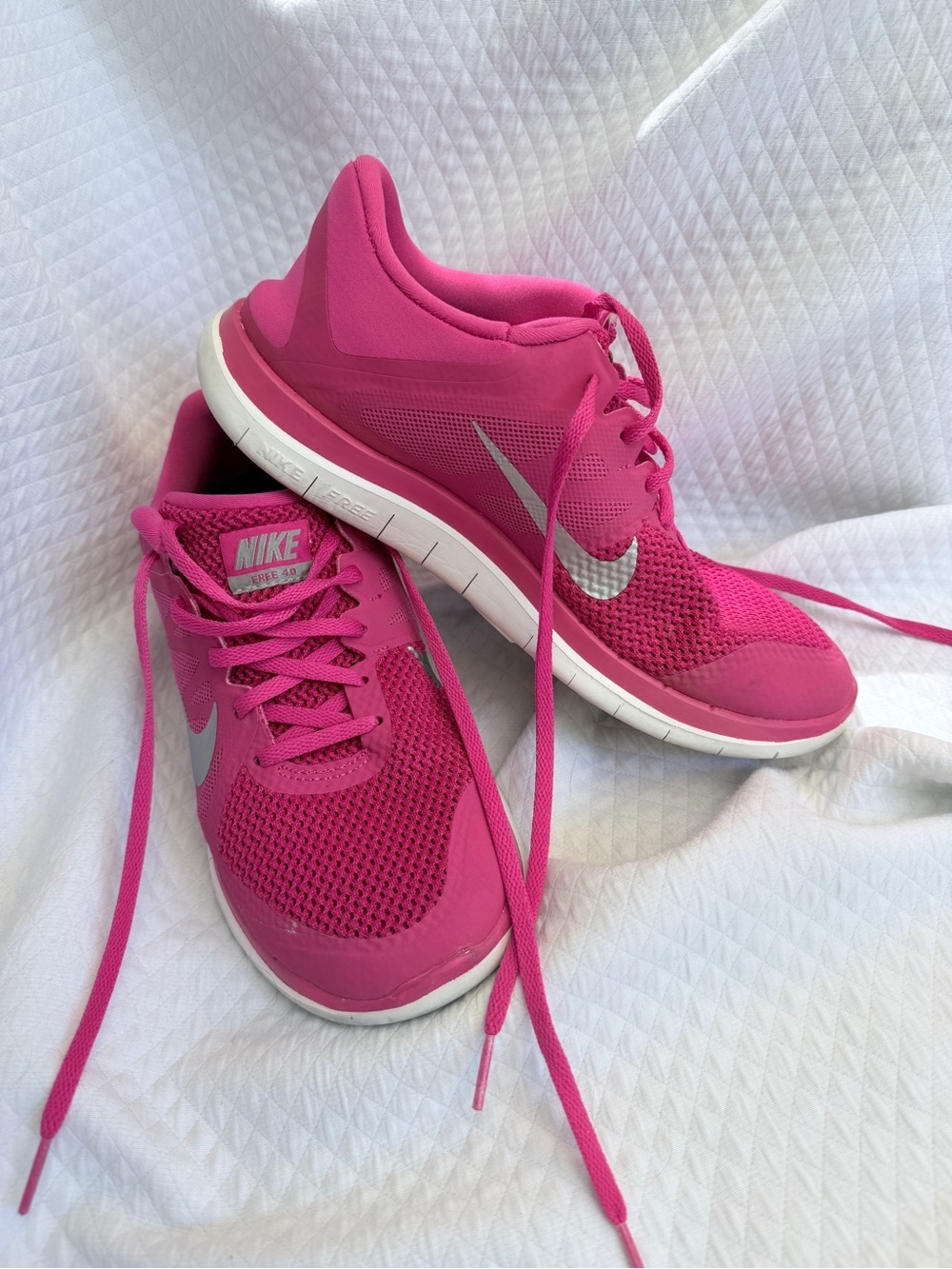 Nike Women's Hot Pink Athletic Running Shoes with Silver Swoosh